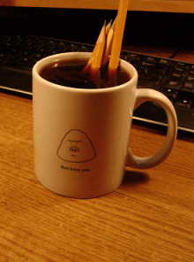 Bert's mug -- coffee + pencils